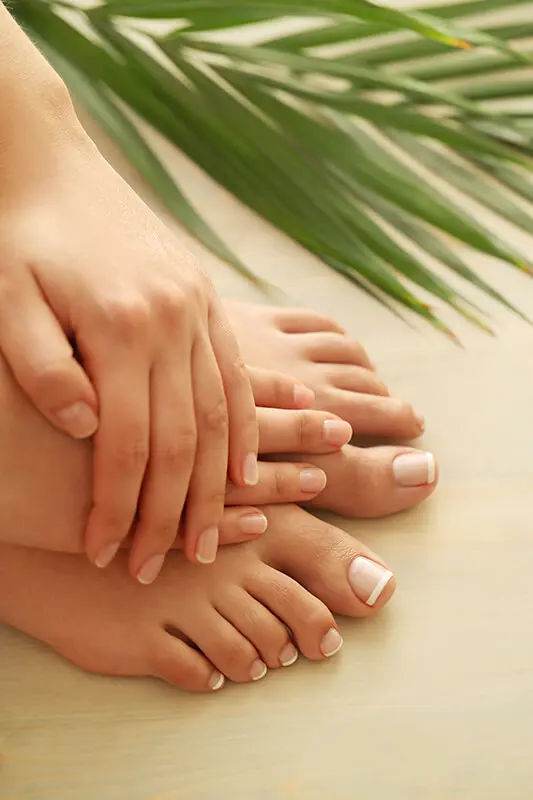 Healthy-looking fingernails and toenails in a clean home setting